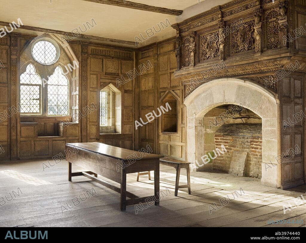 The Solar, Stokesay Castle, Shropshire, c1997-c2016. Interior view showing the 17th century wood panelling and carved overmantel above the fireplace.