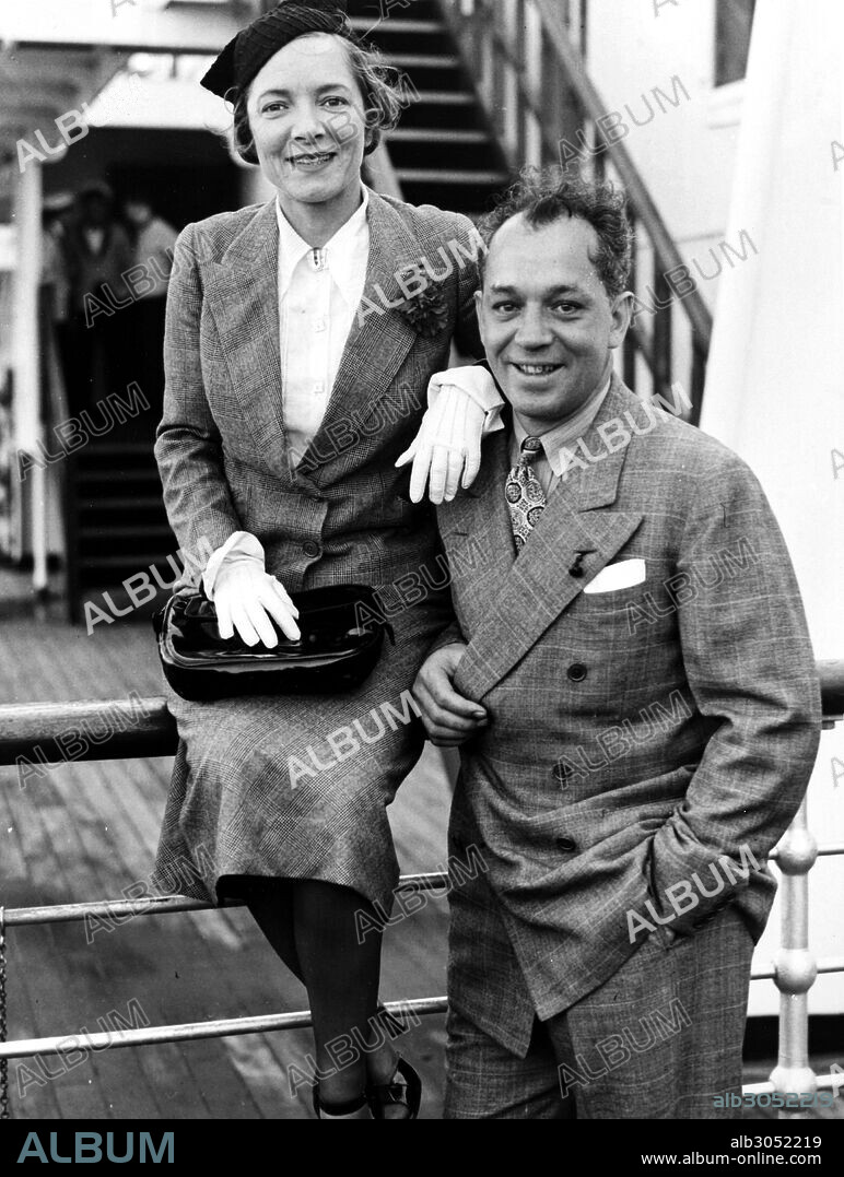 CHARLES MACARTHUR(1895-1956). American journalist and playwright. Photographed with his wife, actress Helen Hayes, aboard the ocean liner Queen Mary, August 1936.