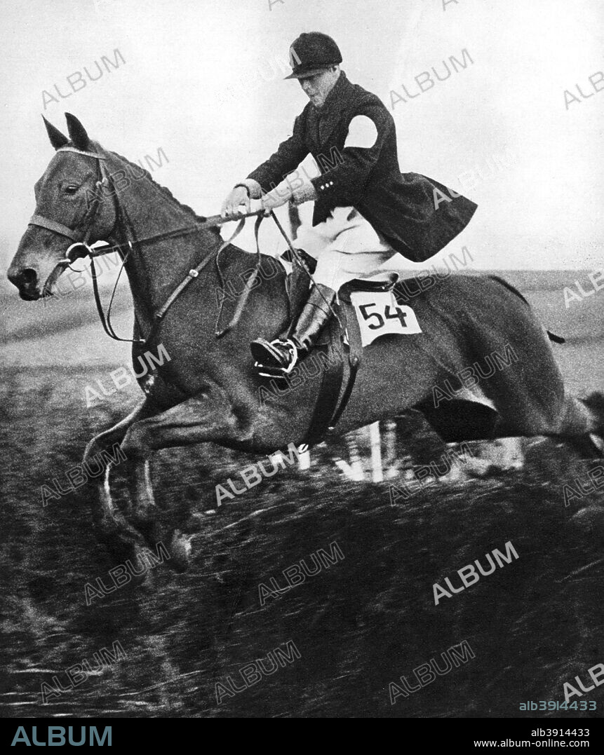 The Prince of Wales taking a fence in the bridge of Guards Challenge Cup race, c1930s. The future King Edward VIII takes part in a sporting event. Illustration from George V and Edward VIII, A Royal Souvenir, by FGH Salusbury, a souvenir book published as Edward VIII was crowned following the death of his father, George V, (Daily Express Publication, London, 1936).
