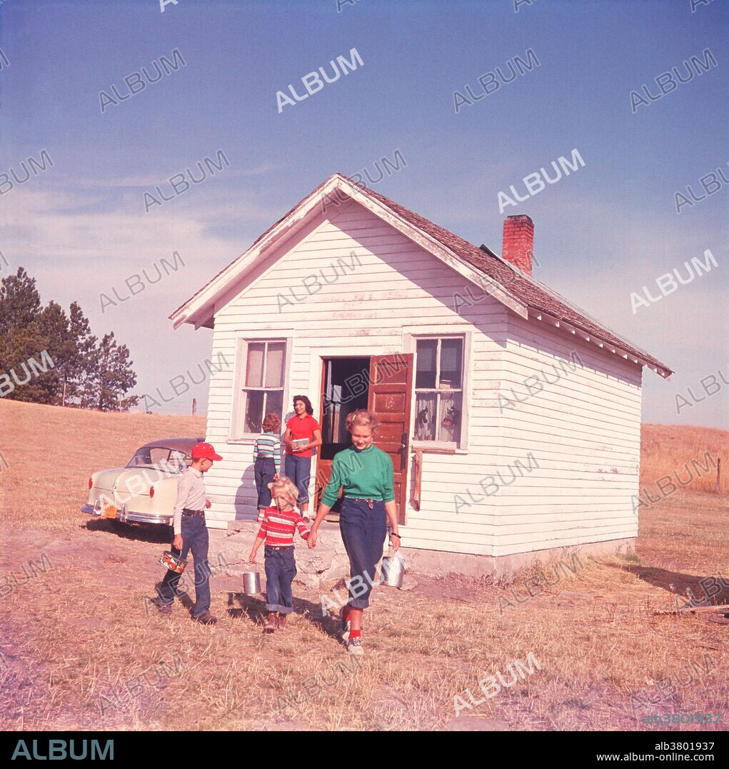 A little one-room schoolhouse at Pine Top had 8 pupils. At the time the photograph was taken (1955), Nebraska had more of these "one-roomers" than any other state.