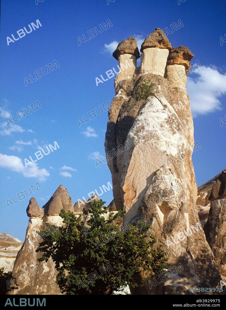 A scenery of the rock formation known as 'Peri Bacalari' or fairy chimneys at Zelve in the Goreme Valley. Cappadocia, Nevsehir district, Turkey.