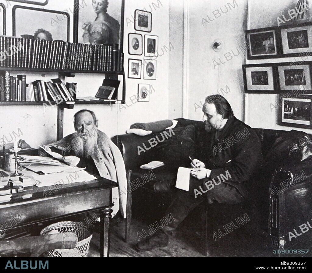 Count Leo Tolstoy at work in his study at Iasnaia Poliana. His friend and secretary, Vladimir Grigorovich Chertkov, takes dictation.