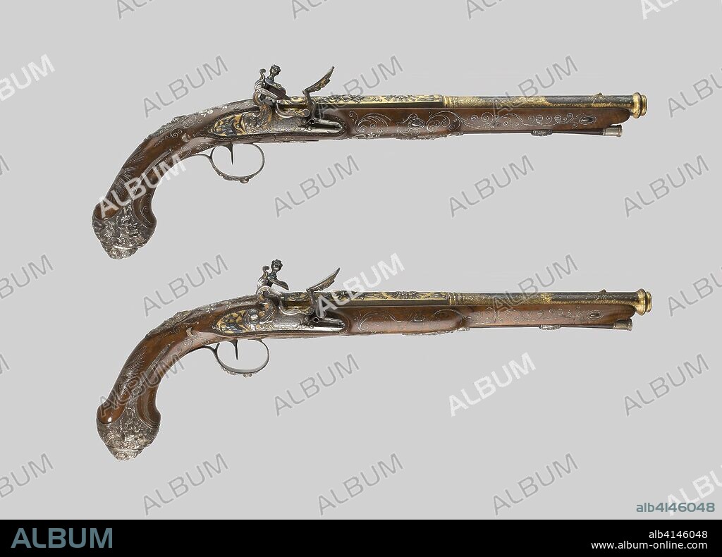 Pair of Presentation Flintlock Pistols in the Eastern Fashion. Gunsmith: Vergnes; (French, active about 1825-45) Marseille. Date: 1801-1825. Dimensions: L. 51.5 cm (20 1/4 in.)
Barrel L. 34.6 cm (13 5/8 in.)
Wt. 2 lb. 14 oz.
Caliber .64. Steel, silver, gold, walnut, and flint. Origin: Marseille.