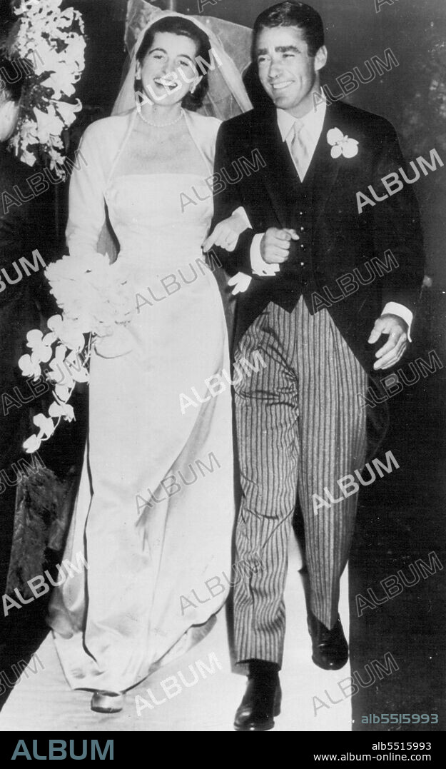 Actor And Bride Come Down The Aisle -- Actor Peter Lawford, son of a British nobleman, and his bride, the former Patricia Kennedy, come down the aisle in St. Thomas More church following their wedding here today. The bride is the daughter of Joseph P. Kennedy, banker and former U.S. ambassador to Britain. Her brother, Sen. John F. Kennedy (D-Mass) was an usher at the wedding. April 24, 1954. (Photo by AP Wirephoto).