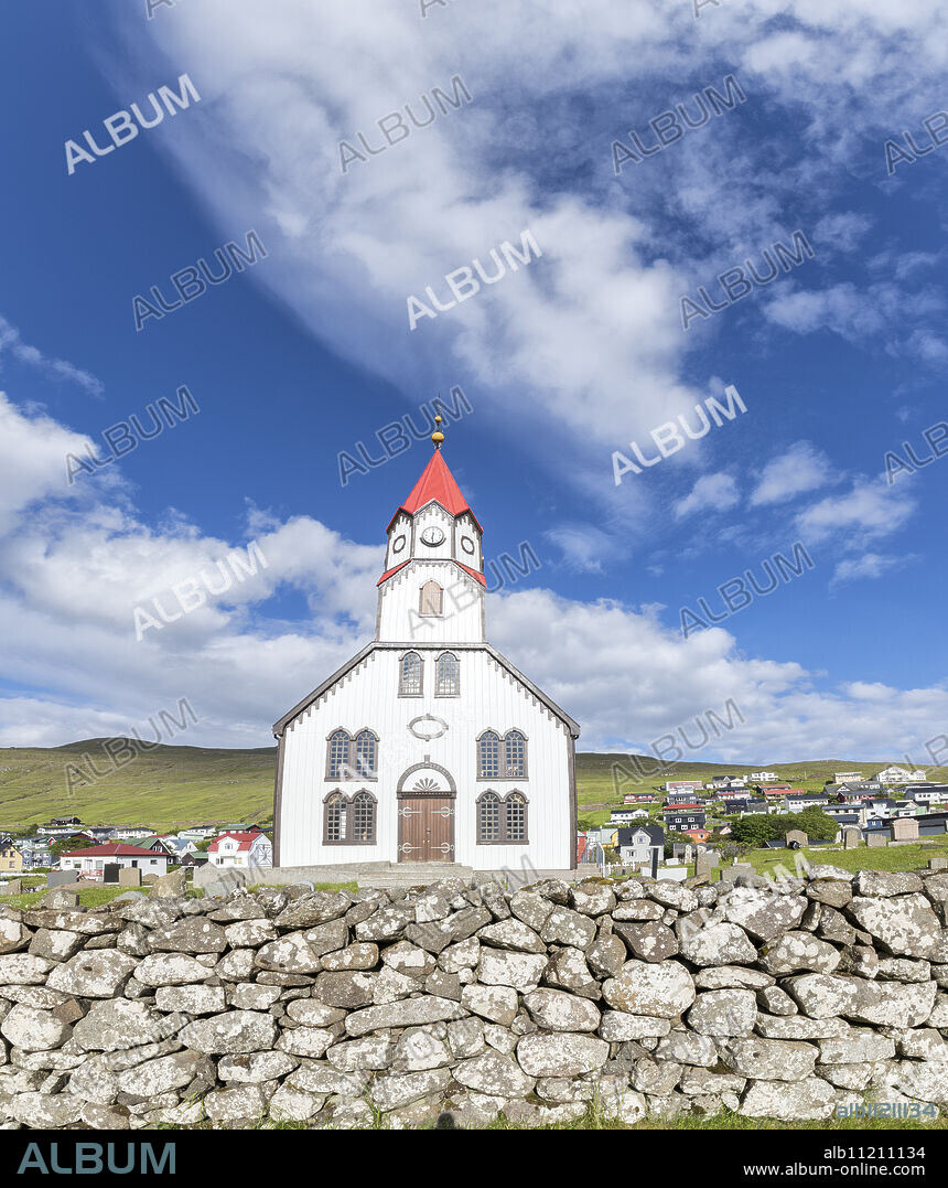 Panoramic of church and village of Sandavagur, Vagar Island, Faroe Islands, Denmark, Europe.