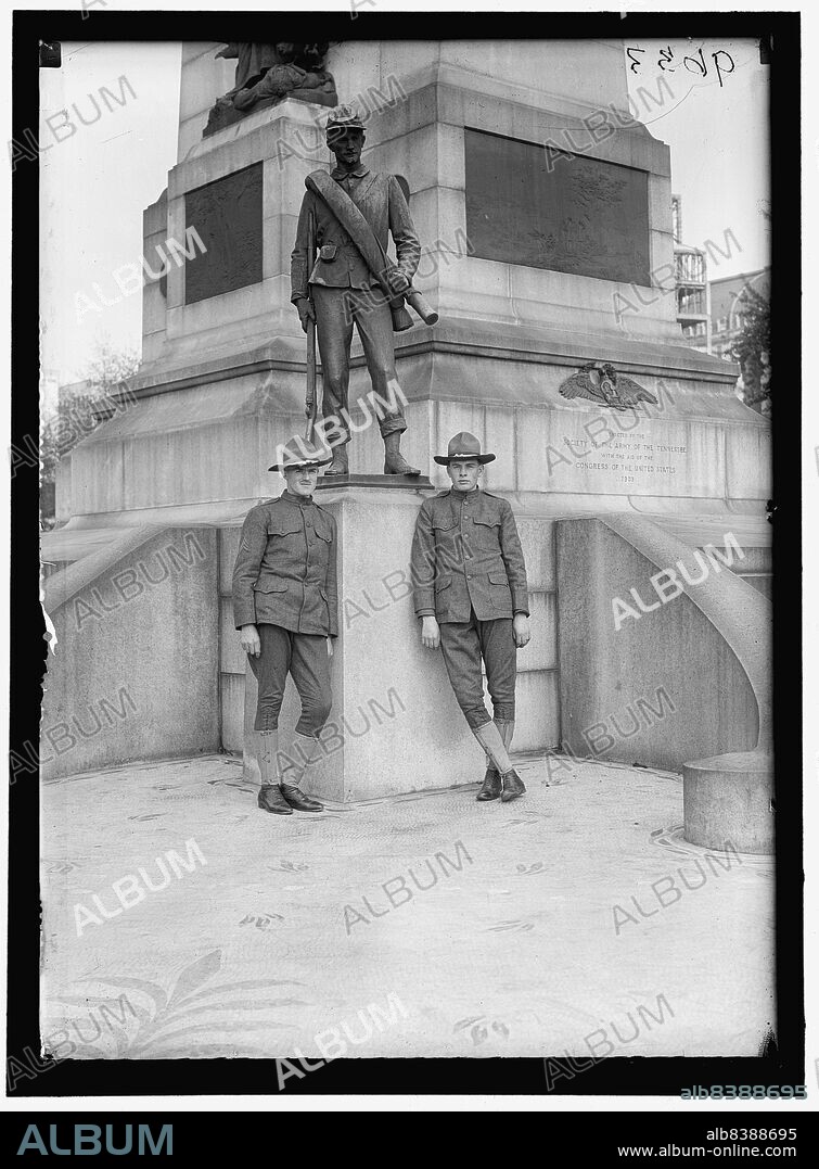HARRIS & EWING. Men in uniform at Sherman Monument, Washington, D.C., between 1916 and 1918. 'Erected by the Society of the Army of the Tennessee with the Aid of the Congress of the United States, 1903'. First World War: US soldiers by the General William Tecumseh Sherman Monument which commemorates the Commanding General of the Union Army during the American Civil War.