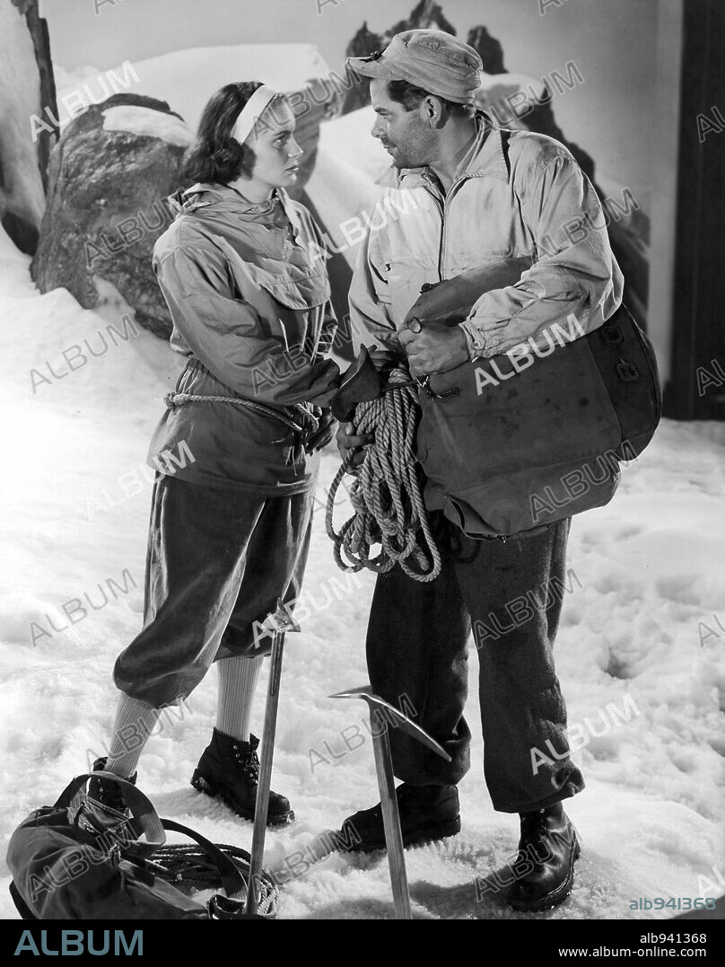 ALIDA VALLI and GLENN FORD in THE WHITE TOWER, 1950, directed by TED TETZLAFF. Copyright RKO.