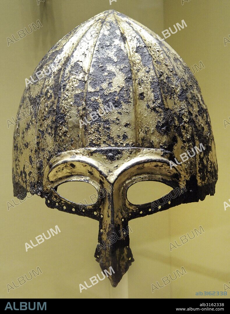 Period of Golden Horde (Ulus Jochi). 13th-14th c. Helmet with a half-mask, eye slits and nose guard. Iron, gilding. The State Hermitage Museum. Saint Petersburg. Russia.