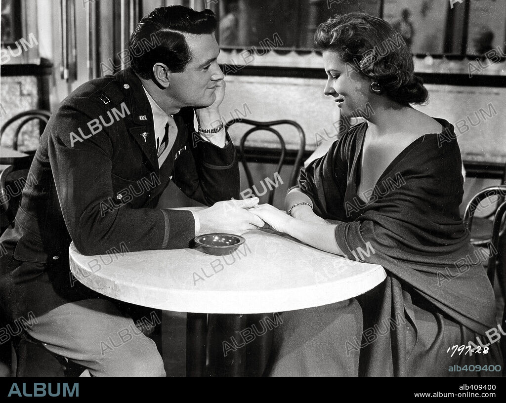 CORNELL BORCHERS and ROCK HUDSON in NEVER SAY GOODBYE, 1956, directed by JERRY HOPPER. Copyright UNIVERSAL PICTURES.