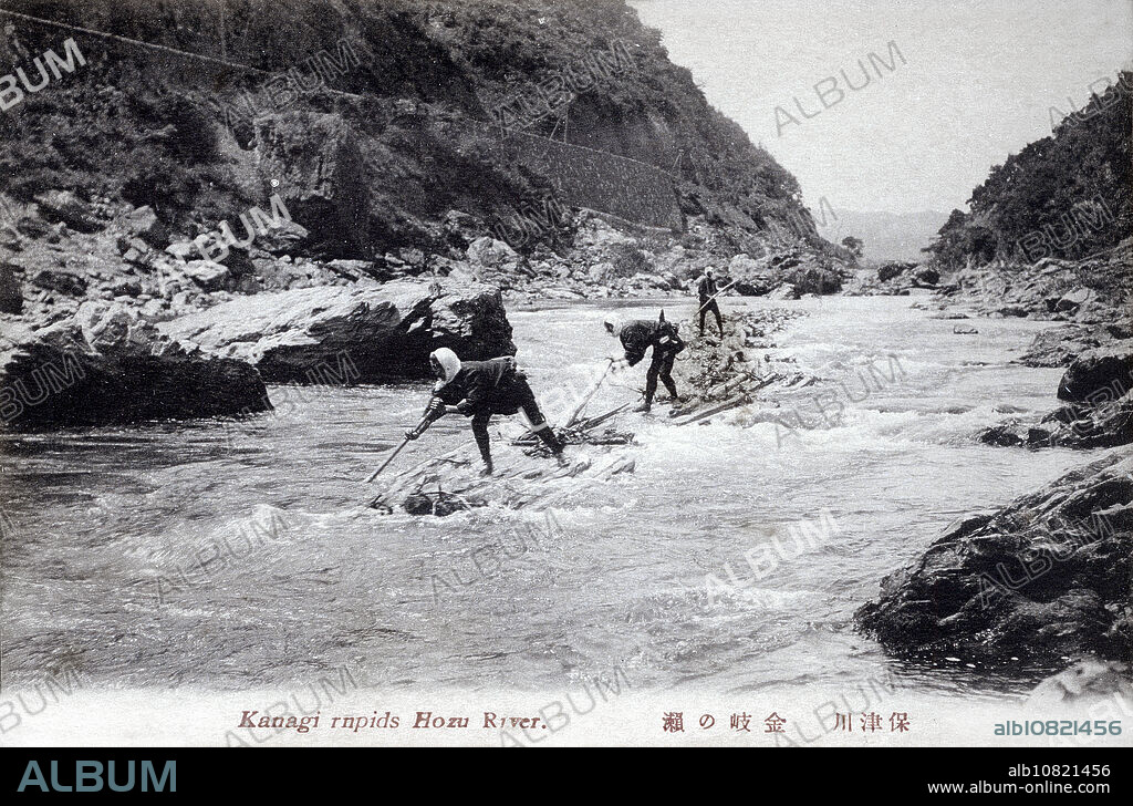 [ 1910s Japan - Japanese Log Raft ] Two men navigate a log raft at the Kanagi Rapids () of Hozugawa River () in Kyoto. For centuries the river was used to transport goods like rice, barley, wheat, charcoal and timber. But from 1895 (Meiji 28), the 2 hour trip down the river became a popular tourist attraction (Hozugawa Kudari). 20th century vintage postcard.
