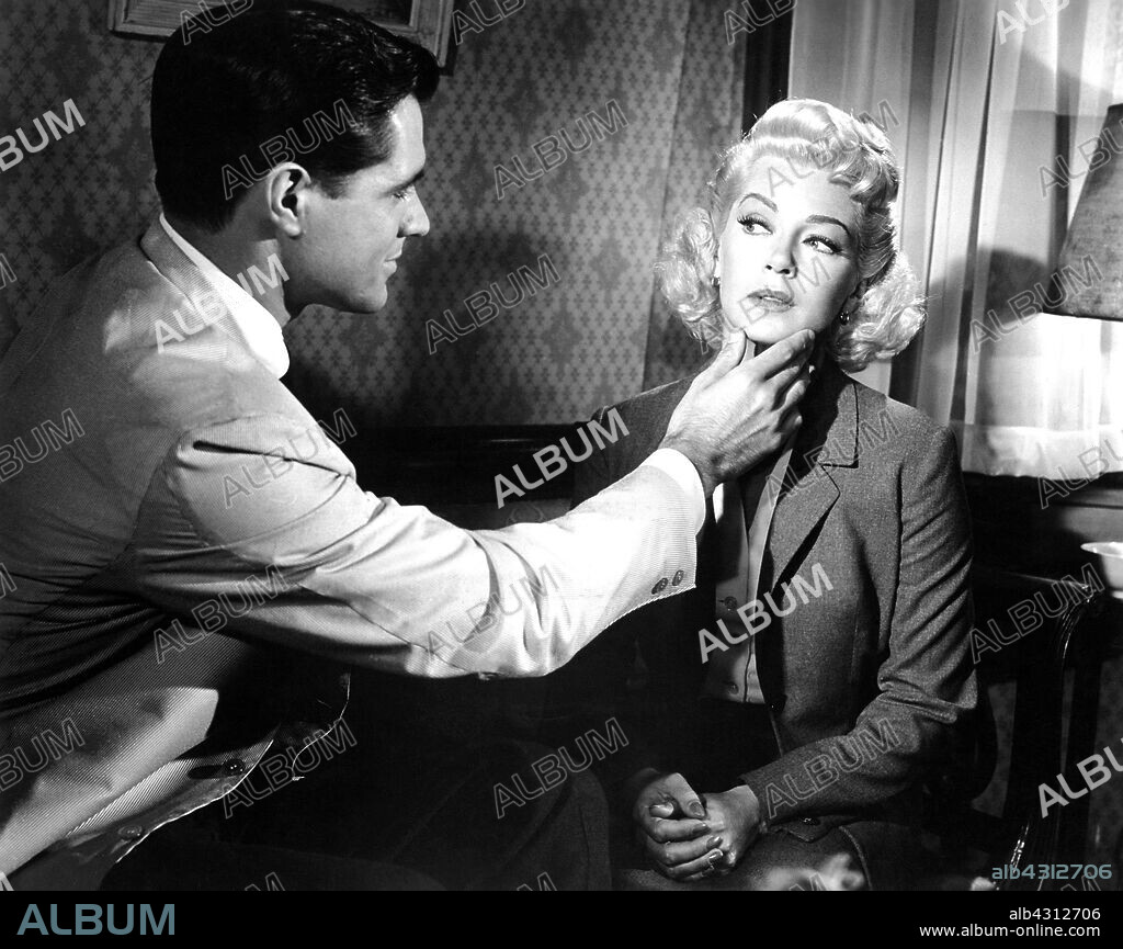 JOHN GAVIN and LANA TURNER in IMITATION OF LIFE, 1959, directed by DOUGLAS SIRK. Copyright UNIVERSAL PICTURES.