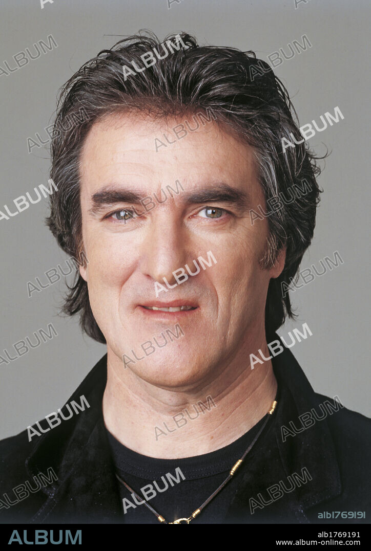 Giancarlo Golzi. Founder and drummer of the Italian musical group Matia Bazar Giancarlo Golzi smiling. 2000.