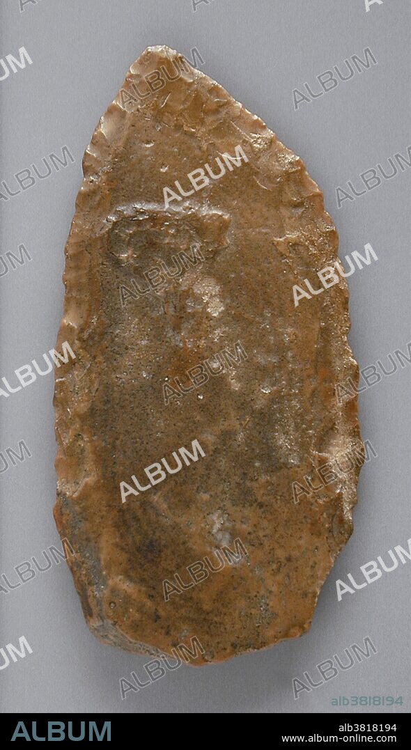 Egyptian flint, Neolithic Period (5500 - 3100 BC). A hand axe or biface is a prehistorical stone tool with two faces, and the longest-used tool in human history. Its technical name (biface) comes from the fact that the archetypical model is a generally bifacial Lithic flake with an almond-shaped morphology. The most common hand axes have a pointed end and rounded base, which gives them their characteristic shape, and both faces have been knapped to remove the natural cortex, at least partially.