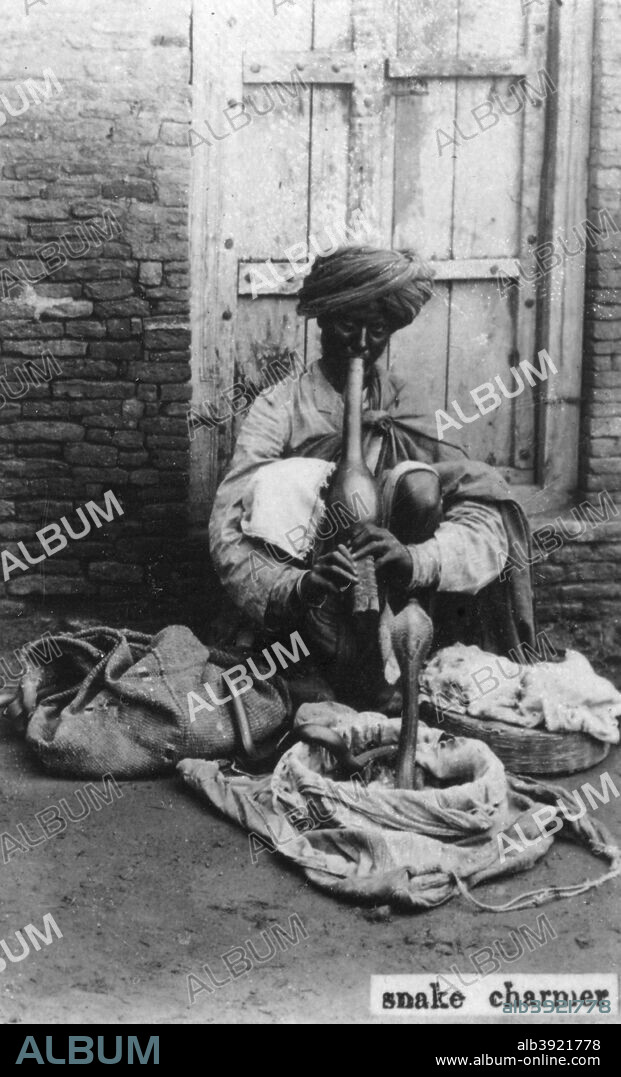 Snake charmer, India, 20th century.