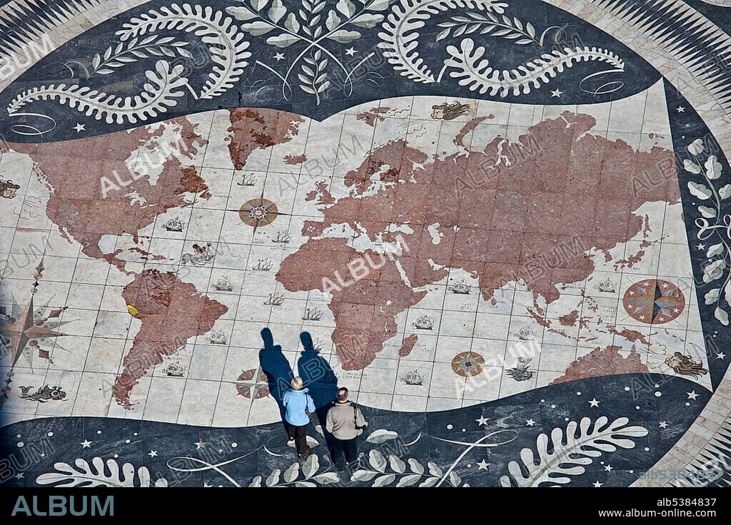 Tourists on a giant world map at the foot of the Monument to the Discoveries, Padrao dos Descobrimentos, Belem, Lisbon, Portugal, Europe