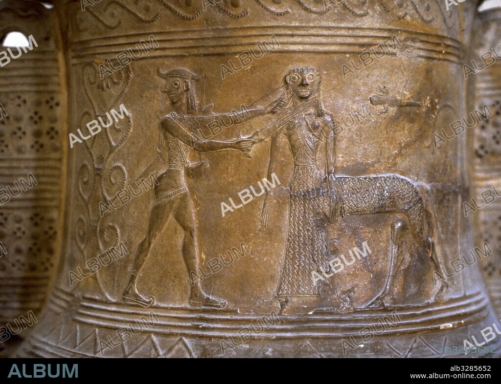 Perseus (left, wearing a hat, winged boots and the kibisis slung over his shoulder) averts his gaze as he kills Medusa, figured here as a female centaur. Detail from an orientalizing relief pithos. Louvre Museum. Paris. France.