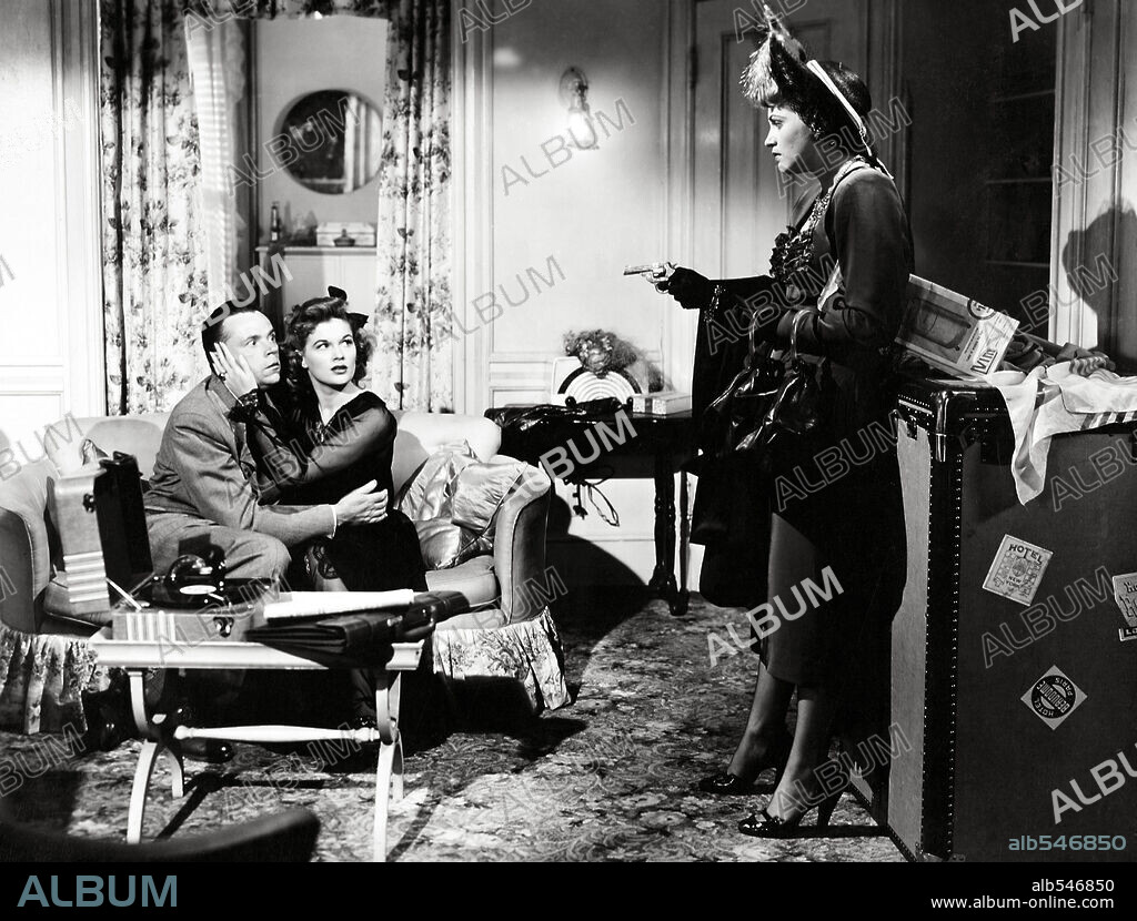 JEAN HAGEN, JUDY HOLLIDAY and TOM EWELL in ADAM'S RIB, 1949, directed by GEORGE CUKOR. Copyright M.G.M.