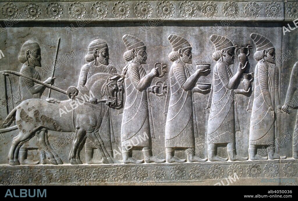 Relief of Syrians or Lydians, the Apadana, Persepolis, Iran. The capital of Achaemenid Persia, Persepolis was predominantly built during the reigns of the dynasty's founder, Darius I (522-485 BC) and his son Xerxes I (485-465 BC). One of the main, and earliest, buildings of the city was the great audience hall, the Apadana. Every year the king would receive tribute in the form of gifts from representatives of all the poples of the Achaemenid empire, which at its greatest extent stretched from Libya in the west to the Indus valley in the east. The eastern entrance to the Apadana was decorated with reliefs of the empire's subject peoples.
