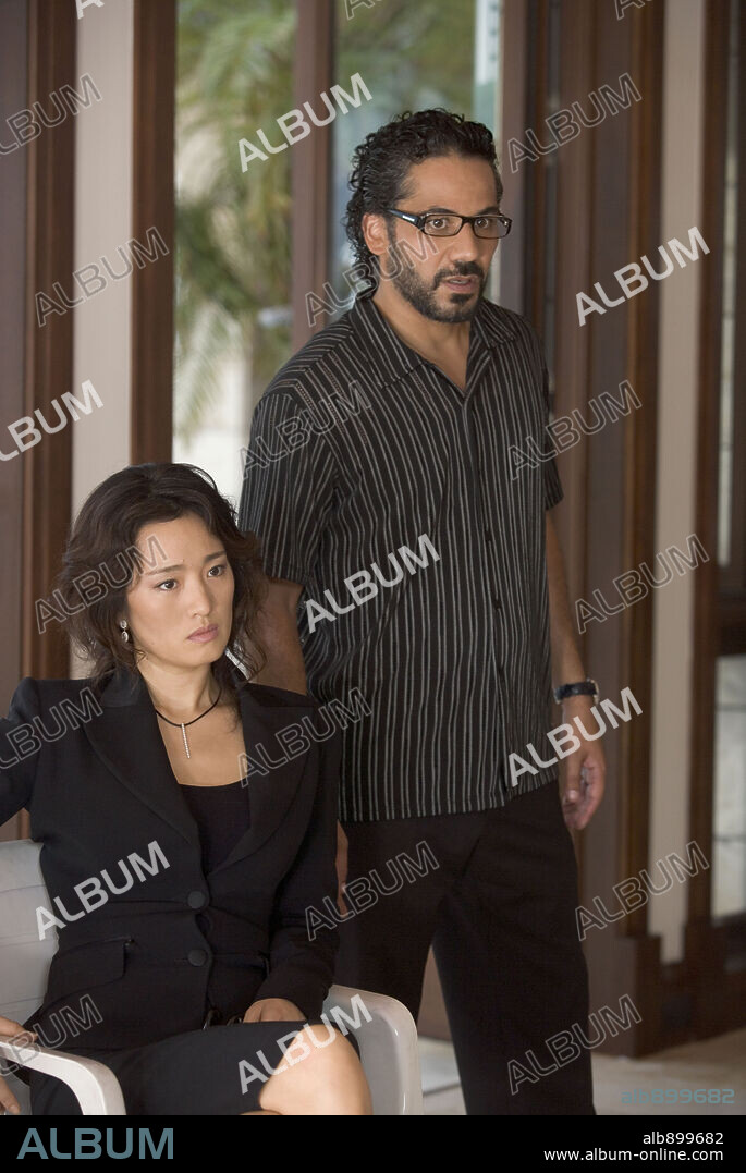 JOHN ORTIZ and LI GONG in MIAMI VICE, 2006, directed by MICHAEL MANN. Copyright UNIVERSAL PICTURES / CONNOR, FRANK.