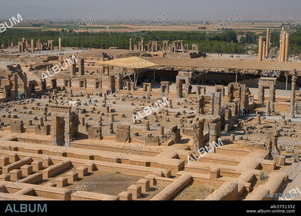 Overview of Persepolis from Tomb of Artaxerxes III, Palace of 100 Columns in foreground, UNESCO World Heritage Site, Iran, Middle East.