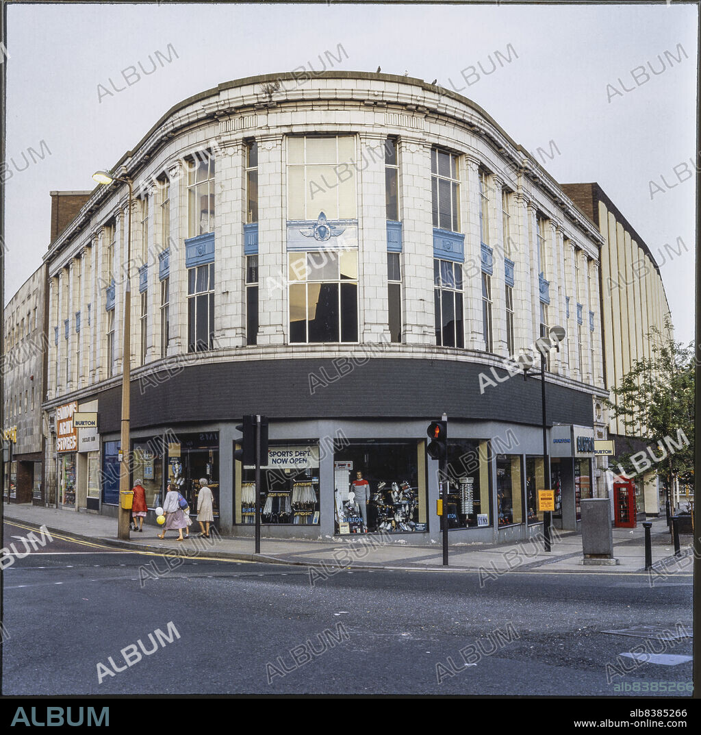 NICHOLAS ANTHONY JOHN PHILPOT. Burton,  2-8 Queen Street, Barnsley, 1980s. The Burton store at the junction of Queen Street and Eldon Street seen from the west. At the time the photograph was taken this building was occupied by Burton. It has subsequently become a branch of the Halifax Building Society.