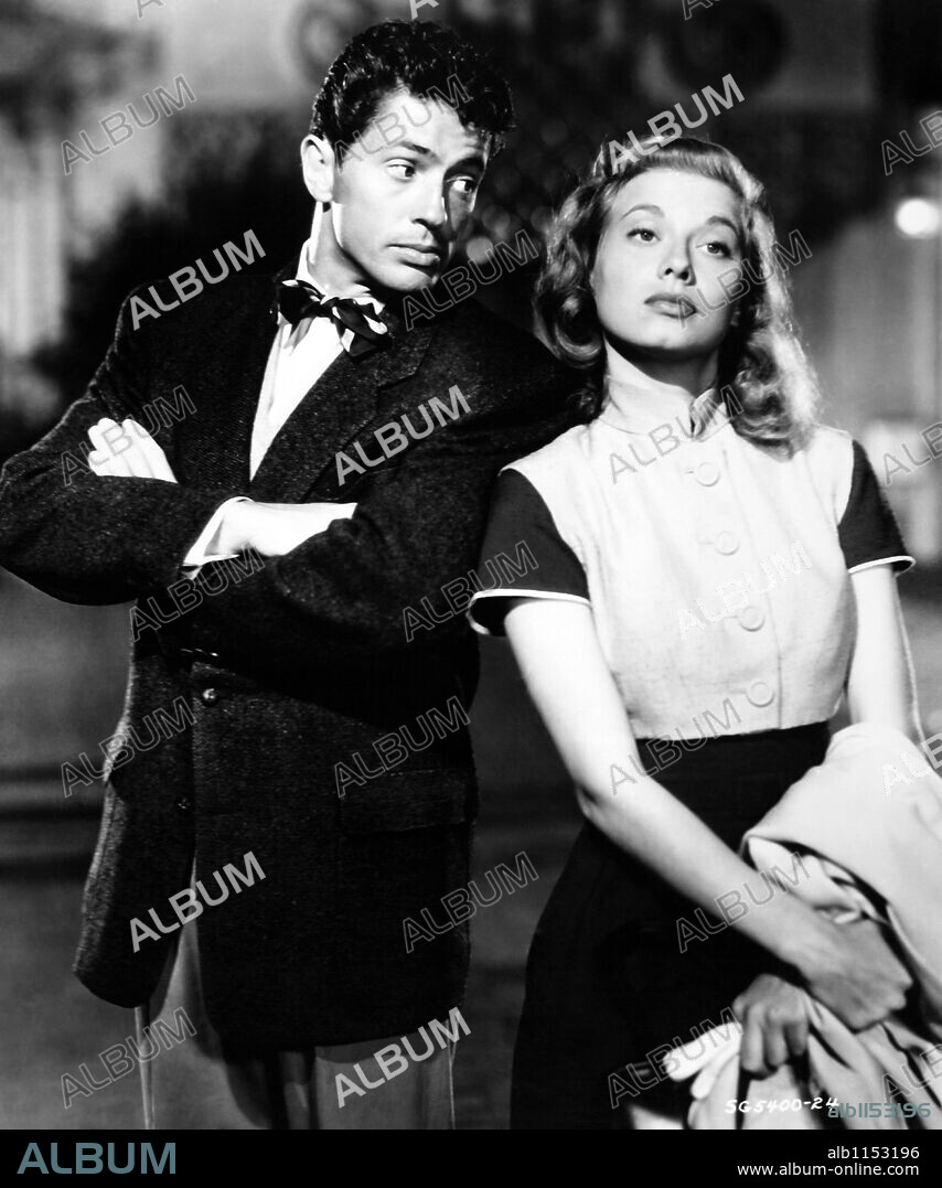 FARLEY GRANGER and PEGGY DOW in I WANT YOU, 1951, directed by MARK ROBSON. Copyright RKO RADIO PICTURES.