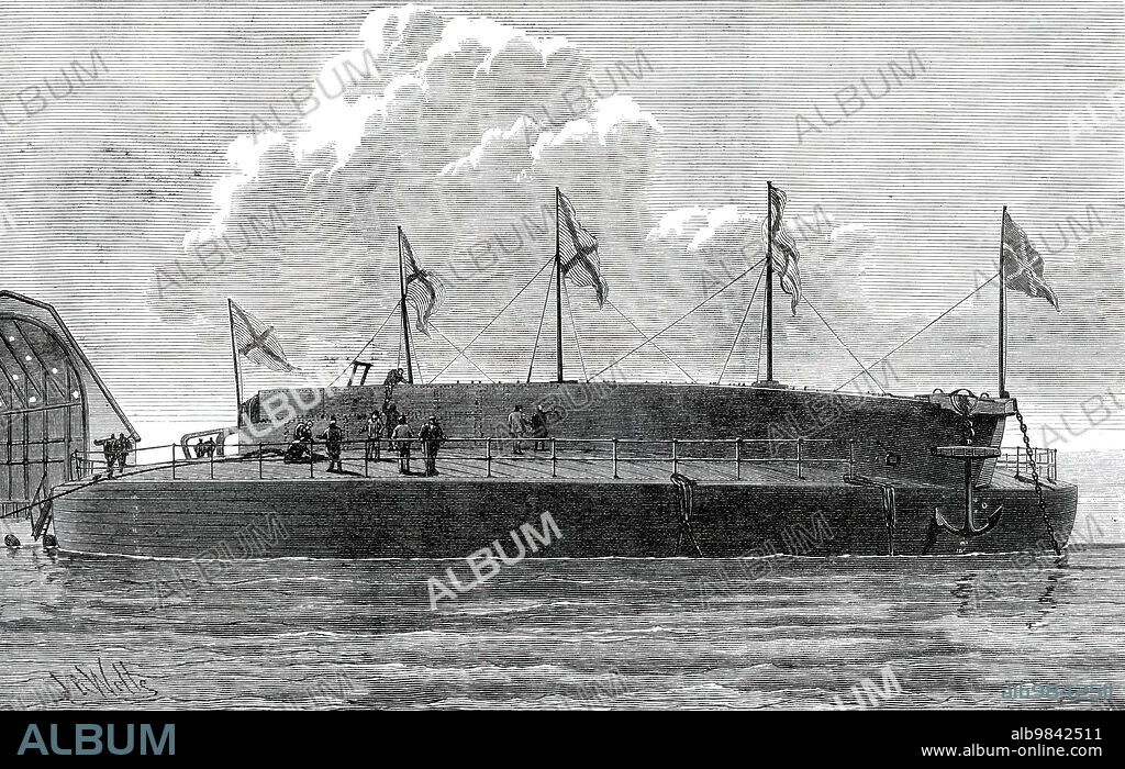 JOSIAH ROBERT WELLS. Launch of the Russian circular ironclad Admiral Popoff, 1876. '...the launch of the Admiral Popoff...took place...at the port of Nicolaieff, which is situated on the river Bug, , and is now the great naval station of the Russian Black Sea Fleet. The vessel, in so far as the hull is concerned, was completely built and armour-plated, and also sheathed with wood sheathing over the whole bottom, and covered with copper sheets, before the launch took place...The Admiral Popoff is to be completed with all possible dispatch...the launching of a body 120 feet broad, and drawing between nine and ten feet of water, even when light, into a comparatively narrow river like the Ingul--for the dockyard of Nicolaieff stands upon the last bend of the Ingul before it empties itself into the Bug-produced a great disturbance of the water and drove much of it away from the shore in the immediate vicinity of the launch'. From "Illustrated London News", 1876.
