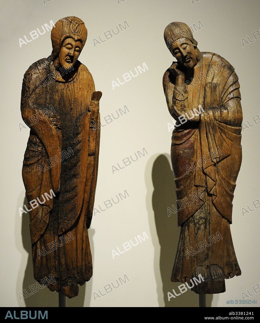 Descent from the Cross. Figures of Virgin Mary and Saint John the Evangelist. Second half of 12th century. Wood. From Parish Church of Saint Eulalia of Erill la Vall (Boi Valley, Catalonia). National Art Museum of Catalonia. Barcelona. Catalonia. Spain.