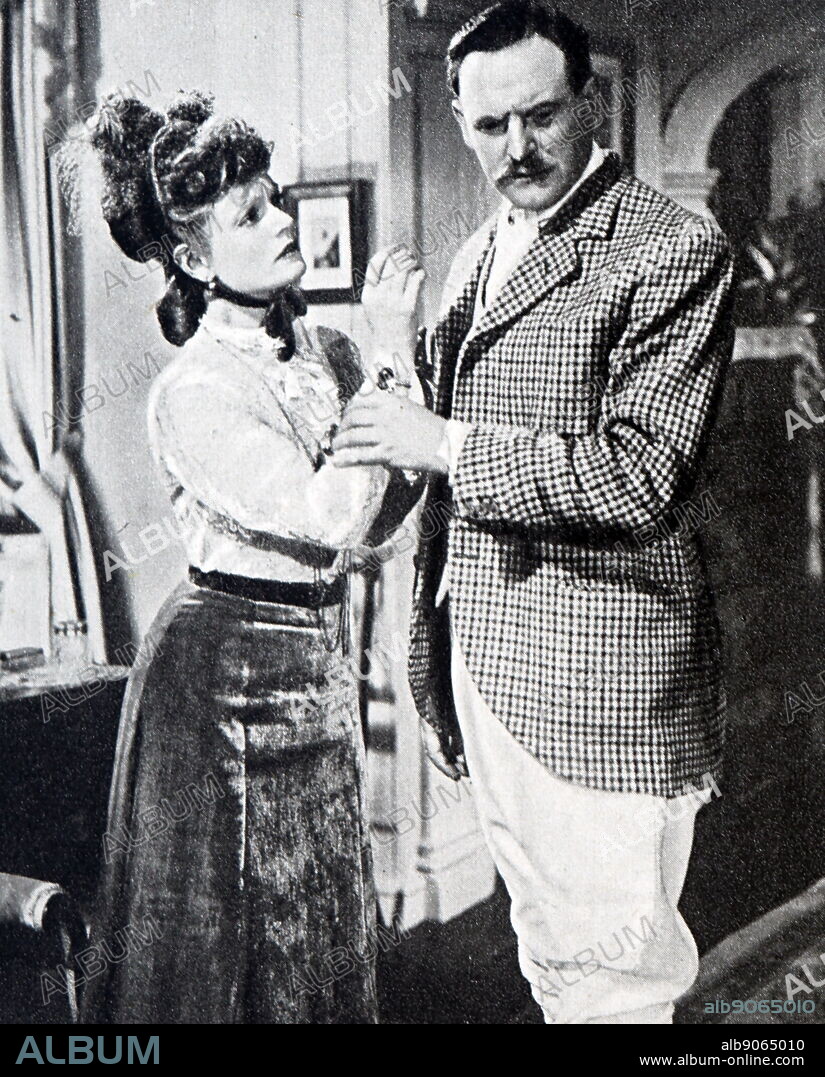 Film still from 'Elizabeth of Ladymead' starring Anna Neagle, Hugh Williams, Nicholas Phipps, and Bernard Lee.