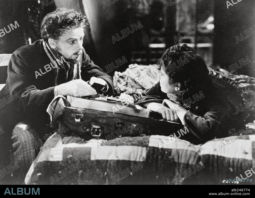 GLORIA HOLDEN and PAUL MUNI in THE LIFE OF EMILE ZOLA, 1937, directed by WILHELM DIETERLE. Copyright WARNER BROTHERS.