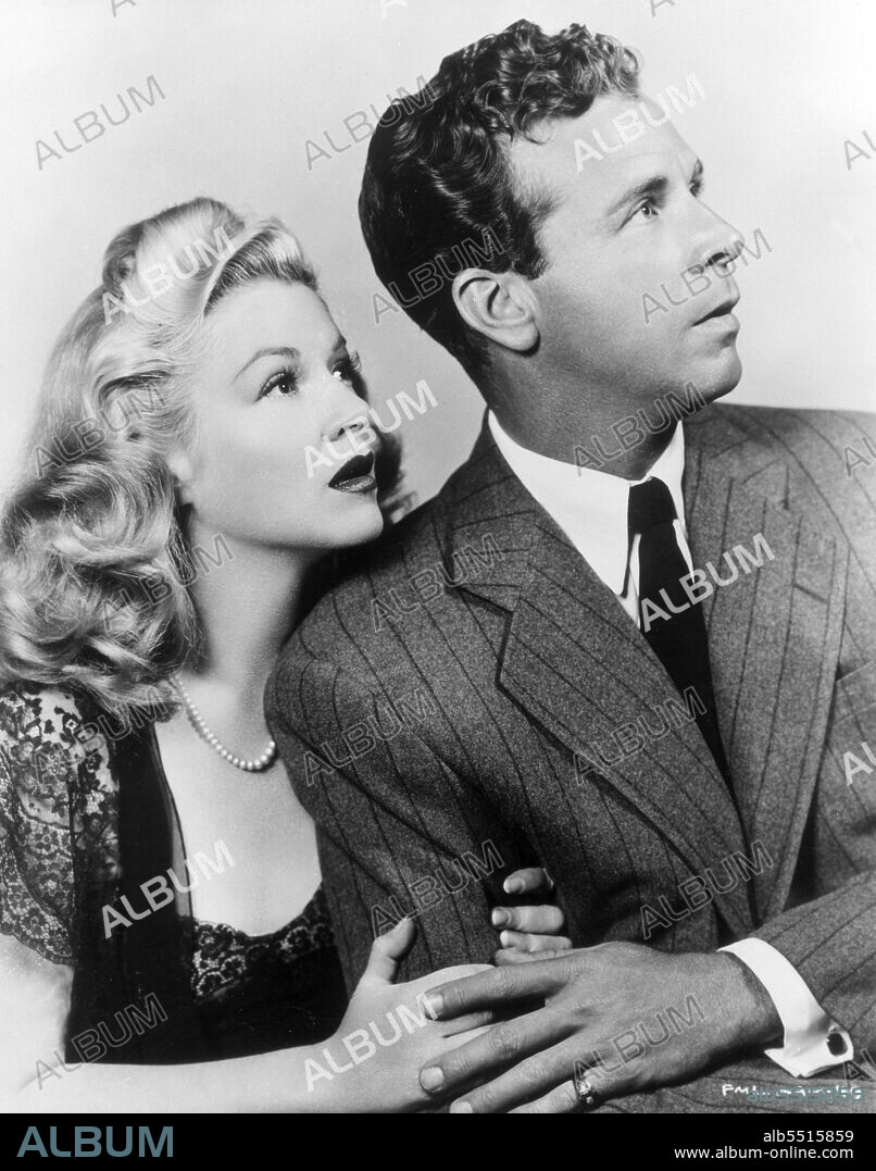 CLAIRE TREVOR and DICK POWELL in MURDER, MY SWEET, 1944, directed by EDWARD DMYTRYK. Copyright RKO RADIO PICTURES.