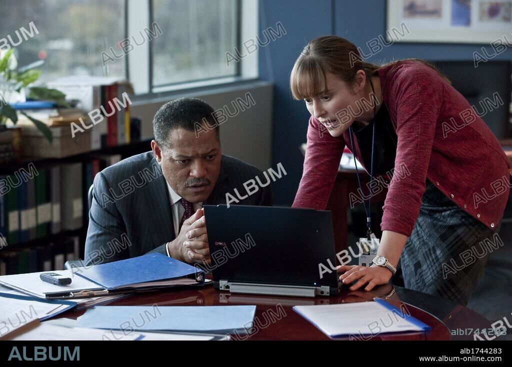 JENNIFER EHLE and LAURENCE FISHBURNE in CONTAGION, 2011, directed by STEVEN SODERBERGH. Copyright WARNER BROS. PICTURES.
