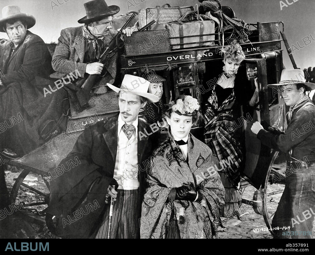 ANDY DEVINE, GEORGE BANCROFT, JOHN CARRADINE, JOHN WAYNE and LOUISE PLATT in STAGECOACH, 1939, directed by JOHN FORD. Copyright UNITED ARTISTS.