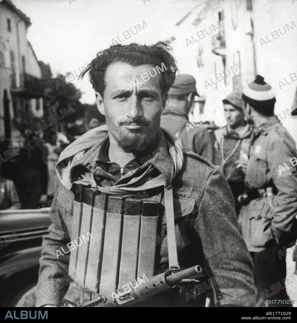 The partisan Stefano Candela known as 'Eolo'. Close up of the partisan Stefano Candela known as 'Eolo', in a village of Piedmont. Italy, October 1944.