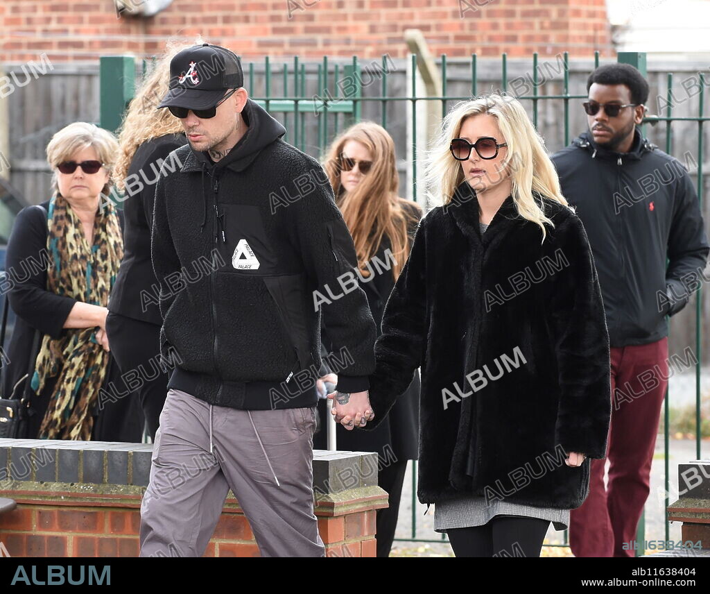 Members of the Amess family [David Amess's wife Julia, Southend rapper Verses Bang with partner Katie, and at the rear Flo Amess with American husband Shawn Braddy] come to pay their respects at Belfairs Methodist Church in Eastwood Road North, Leigh on Sea, Southend on Sea, Essex after Conservative MP Sir David Amess died having being stabbed multiple times at his constituency surgery. Police said a 25-year-old man was arrested on suspicion of murder after the attack at the church in Leigh-on-Sea. They recovered a knife and were not looking for anyone else in connection with the incident.