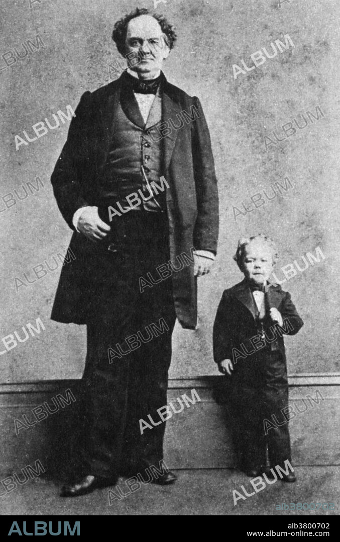P.T. Barnum and George Washington Morrison Nutt (Commodore Nutt). Nutt was a dwarf, who reached a height of 43 inches in his lifetime, and a popular curiosity at the Barnum American Museum. Photographed in 1863.