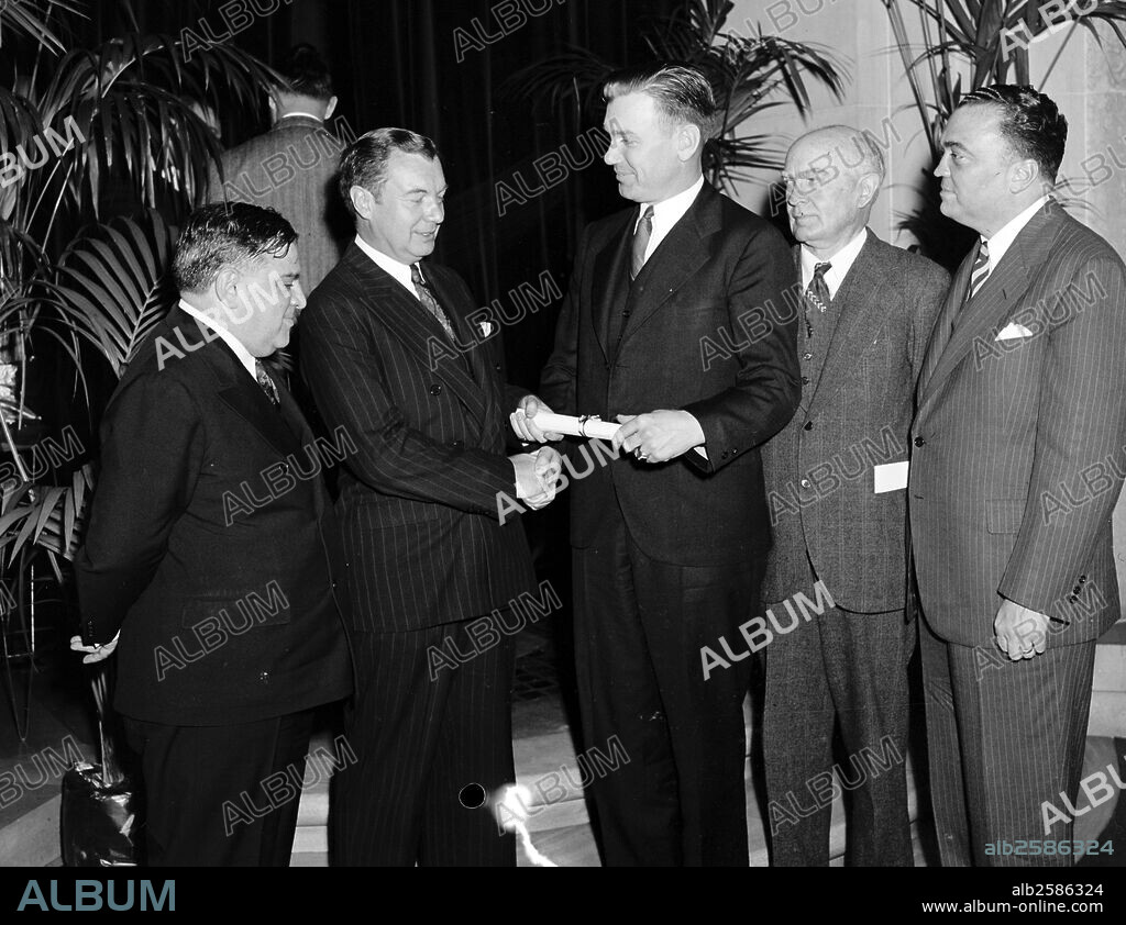 Group, includes Robert Jackson, 2nd from left; and J. Edgar Hoover, right 19400101. J. Edgar. Hoover 1895-1972. Director of the FBI (Federal Bureau of Investigation), from 1924-1972.
