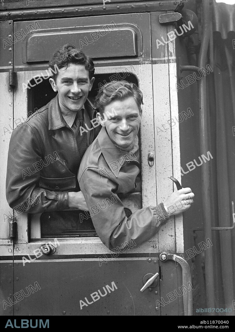 £30 WORLD TOURISTS SET OFF - AROUND THE WORLD IN THREE YEARS. Robert Booth, 21-year-old ex-soldier of Streatham, London, and Peter Newman, 22-year-old ex Royal Navy man of Chigwell, Essex, left Victoria station, London, today at the start of a round the world hitch hike in the capital for £30. Setting out from France and passing through Italy, Greece and Turkey on the first part of the journey, the men will work their way by doing odd jobs such as dishwashing. They hope to reach Helsinki in time for the 1952 Olympic games and to complete their global tour in 3 years. PICTURE SHOWS:- Peter Newman (left) and Robert Booth as they left Victoria station today. October 12 1949.