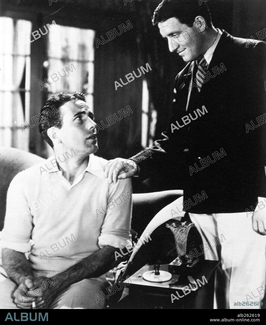 HUMPHREY BOGART y SPENCER TRACY en RÍO ARRIBA, 1930 (UP THE RIVER), dirigida por JOHN FORD. Copyright FOX FILMS.