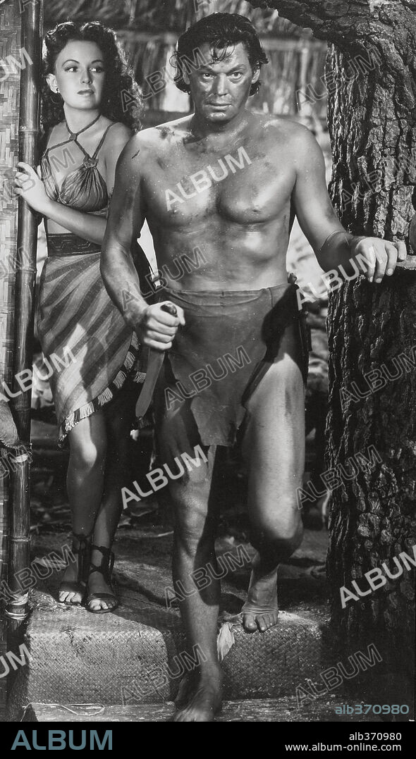 JOHNNY WEISSMULLER in TARZAN TRIUMPHS, 1943, directed by WILHELM THIELE. Copyright RKO.