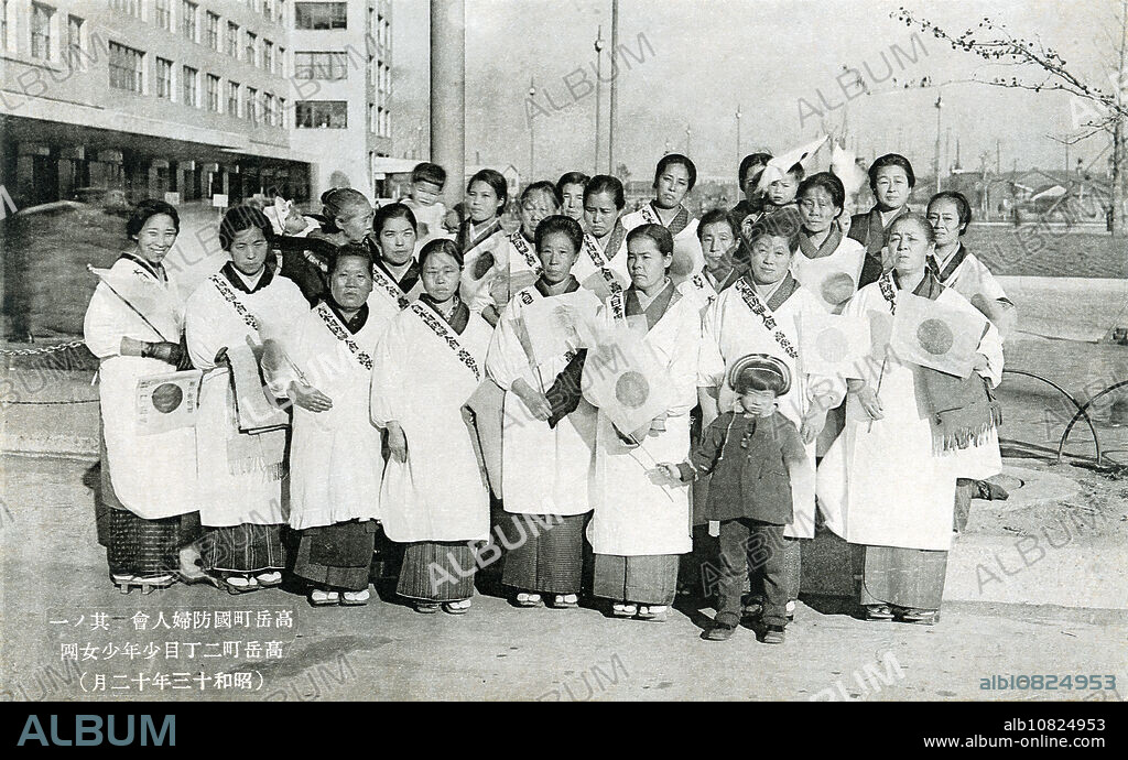 [ 1930s Japan - Patriotic Japanes Women ] A local chapter of the Women's Society for National Defense (, Kokubo Fujinkai) in Takaokacho (), Nagoya, Aichi Prefecture in December 1938. The Kokubo Fujinkai was a patriotic women's association active between 1932 and 1942. The role of such organizations was to encourage patriotism and to define the ideal relation between women and the nation, generally by emphasizing home and motherhood. 20th century vintage postcard.