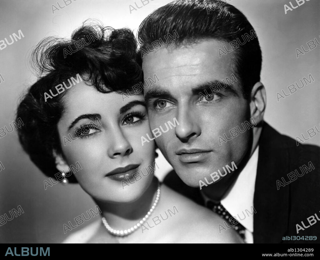ELIZABETH TAYLOR and MONTGOMERY CLIFT in A PLACE IN THE SUN, 1951, directed by GEORGE STEVENS. Copyright PARAMOUNT PICTURES.