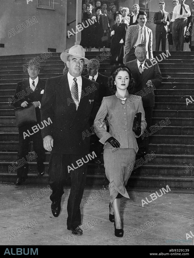 George Stillman and Shirley Temple Leaving Court After Separation From Husband John Agar, Los Angeles, 1949.