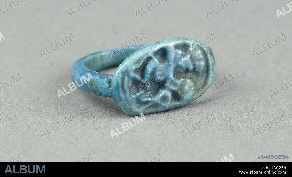 ANCIENT EGYPTIAN. Ring: Figure of Bes playing frame drum, sa (protection) before him. Egyptian. Date: 1390 BC. Dimensions: H. 1 cm (3/8 in.); diam. 2.2 cm (7/8 in.). Faience. Origin: Egypt.