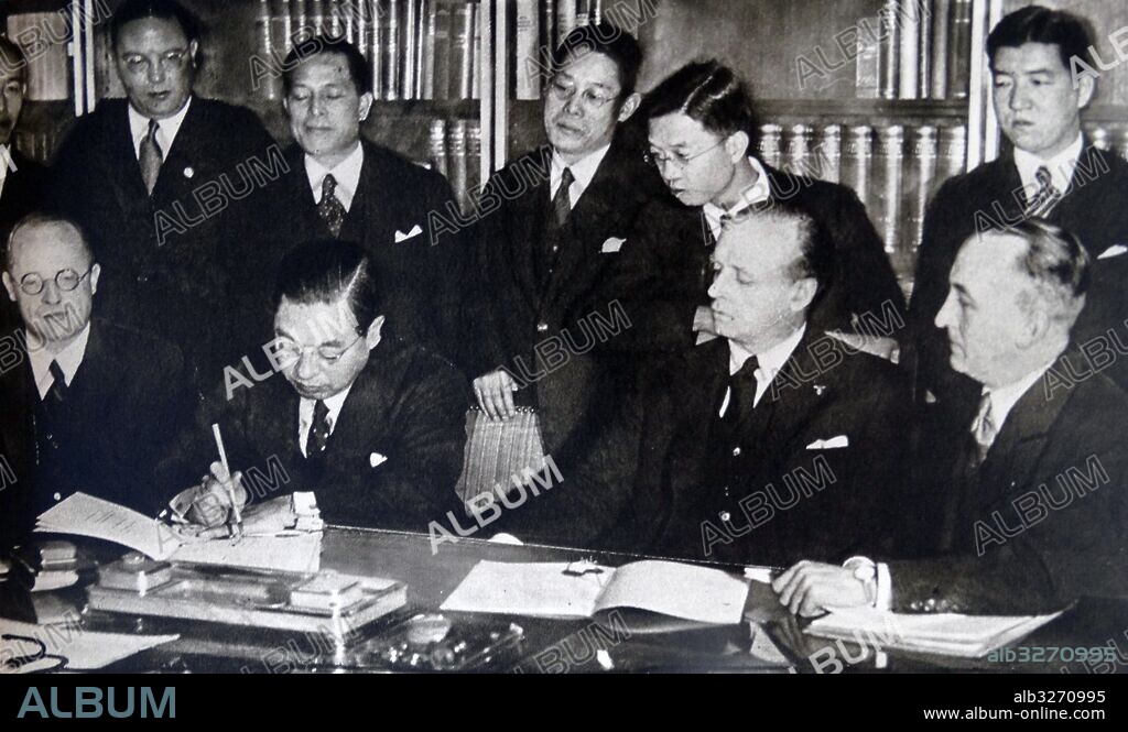 Photographic print of Japanese ambassador Kintomo Mushanokoji and foreign minister of Nazi Germany Joachim von Ribbentrop sign the Anti-Comintern Pact. Dated 20th Century.