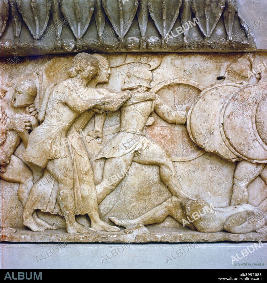 Greek relief detail, Battle of Gods and Giants, Apollo and Artemis fight, 525BC. Treasury of the Siphnians, Delphi.