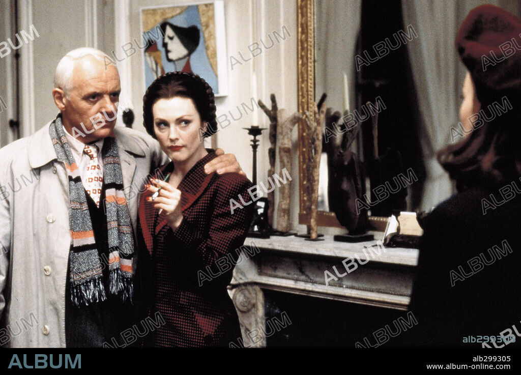 ANTHONY HOPKINS, JULIANNE MOORE and NATASCHA McELHONE in SURVIVING PICASSO, 1996, directed by JAMES IVORY. Copyright WARNER BROTHERS.