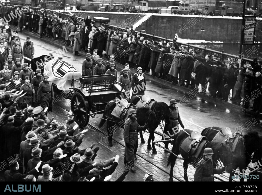 Funeral procession for Fritz Todt. The funeral procession accompanying the remains of Fritz Todt, engineer and soldier of the Third Reich, to the Invalids' Cemetery moves through the crowd, the coffin being placed on a gun carriage drawn by six horses. Berlin, 12th February 1942.