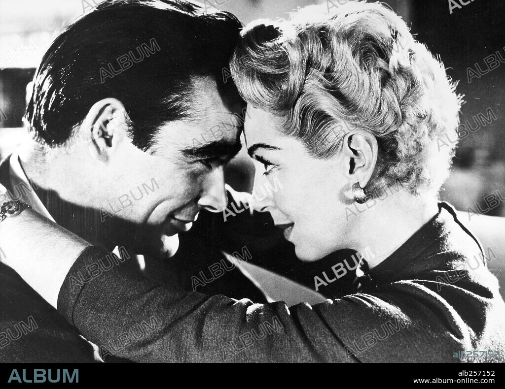 LANA TURNER and SEAN CONNERY in ANOTHER TIME, ANOTHER PLACE, 1958, directed by LEWIS ALLEN. Copyright PARAMOUNT PICTURES.