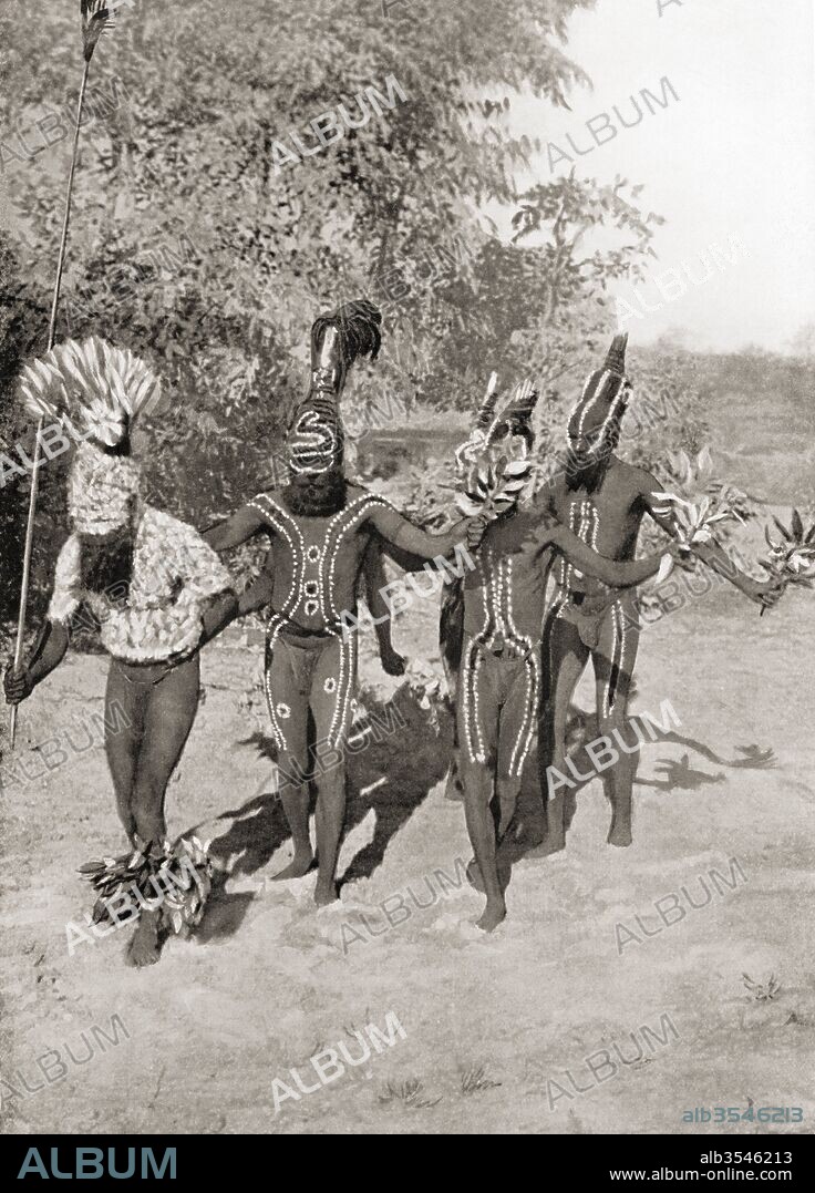 A corroboree, an event where Australian Aborigines interact with the Dreamtime through dance, music and costume. Bodies are painted in different ways, and special adornments are worn. After a 19th century photograph. From Customs of The World, published c.1913.